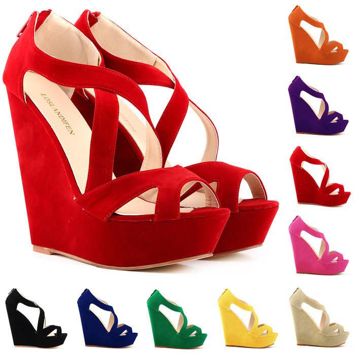 Women's super high heel wedge sandals featuring stylish cross straps and a bold platform design, perfect for elevating summer outfits.