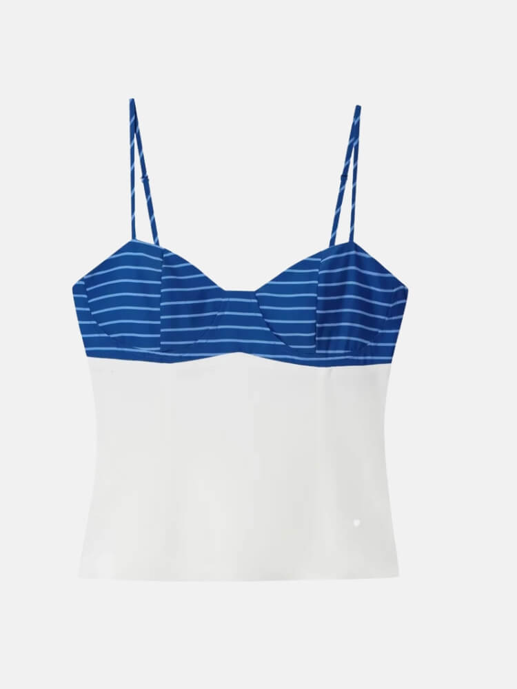 Close-up of the blue striped fabric and sweetheart neckline detail on a Y2K crop top.