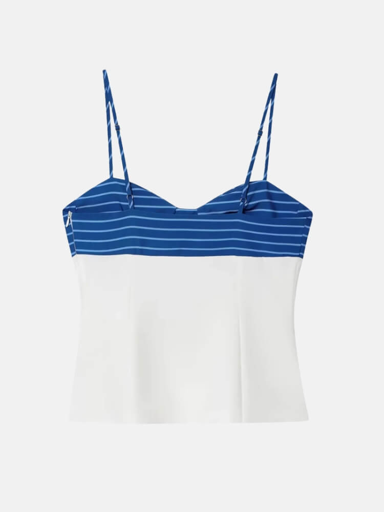 Matching blue and white summer outfit for women inspired by coastal and nautical fashion.